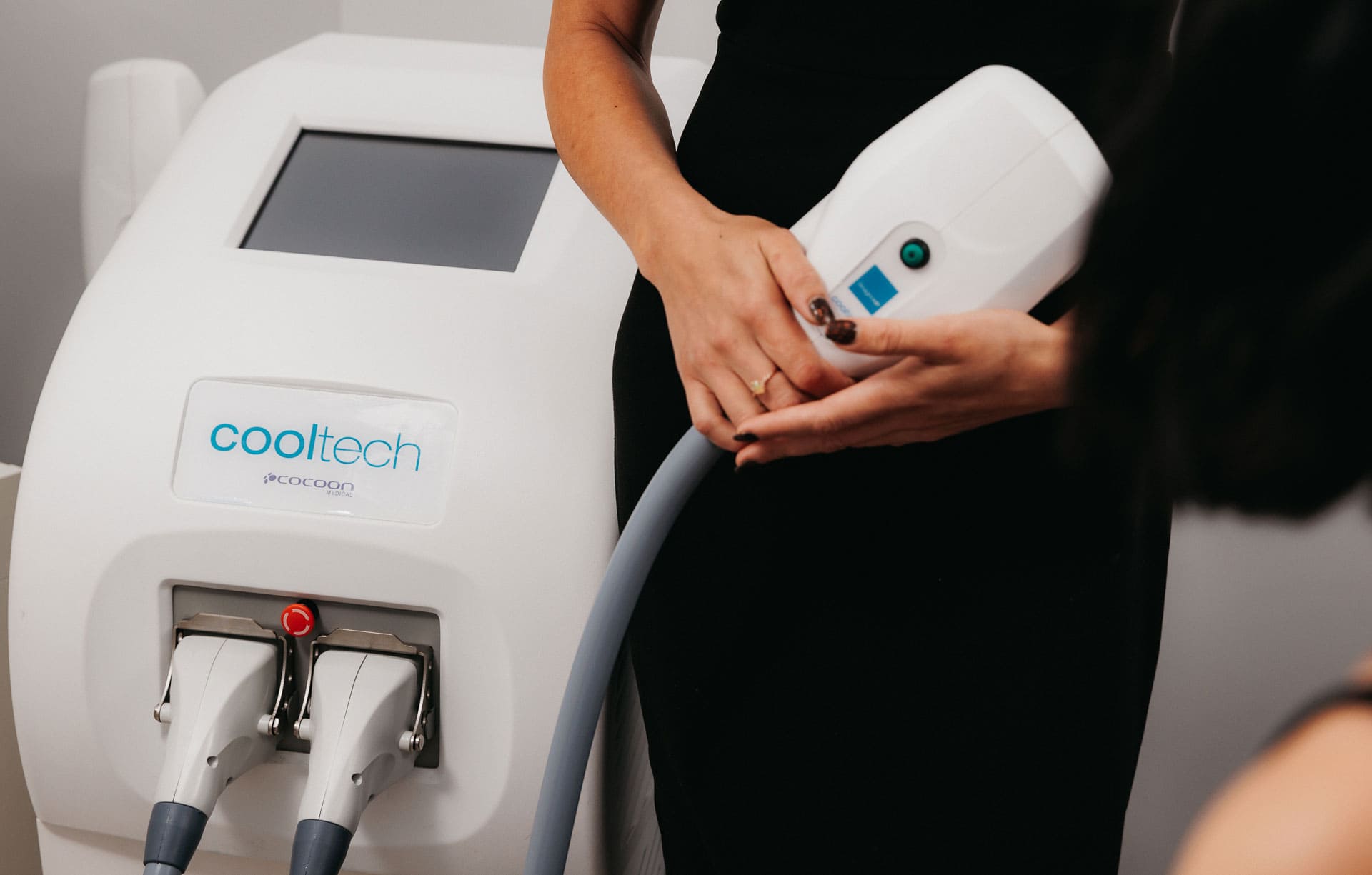 Women holding machine for Non Surgical Body Shaping
